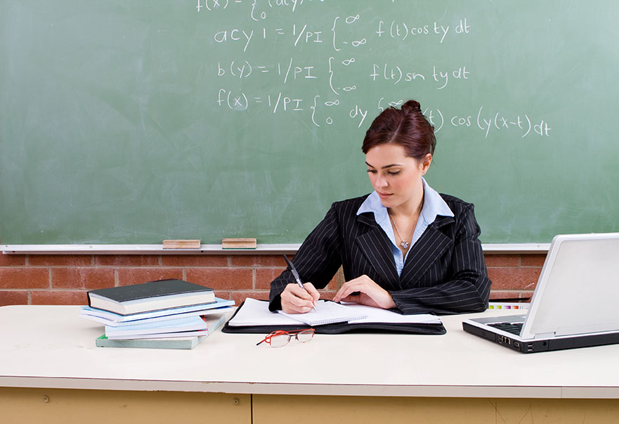 Teacher at desk